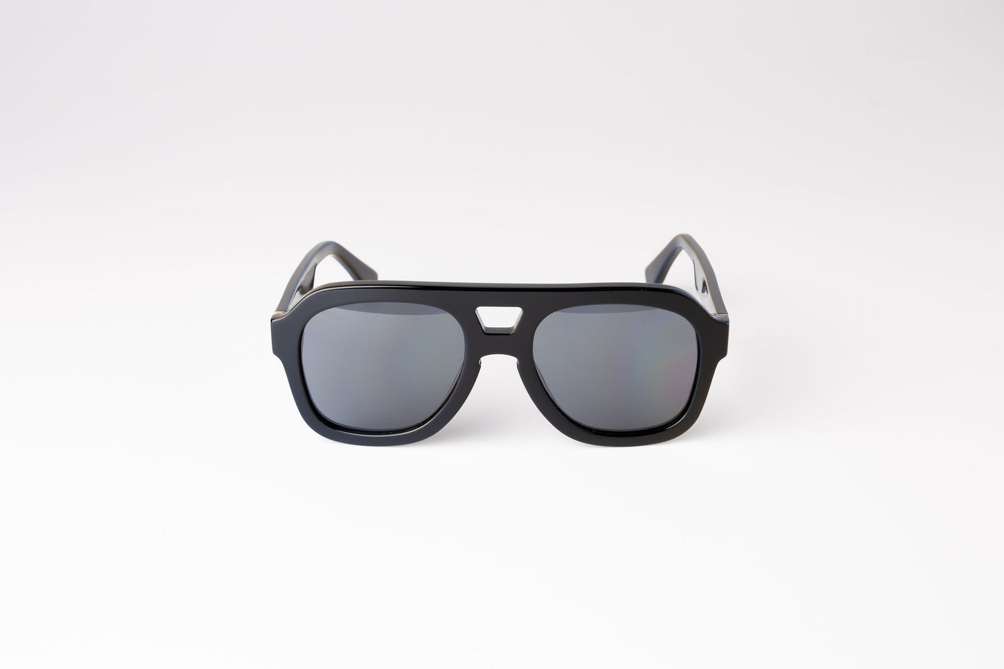 front view of large black sustainable and biodegradable malone charcoal aviator sunglasses with dark grey lens